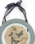 Set of Two Green And Ivory Butterfly Glass Circle
