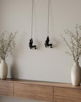 Set of Two Black Resin Climbing Man Hanging Dimensional Sculpture