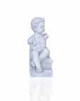 Vintage Look Off White Boy Sitting Statue