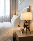 Black Metal Tripod Leg With Antique Brass Accent Table Lamp