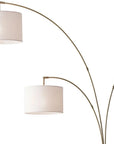 74" Brass Three Light Arc Floor Lamp With Off White Fabric Drum Shade