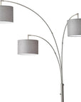 74" Brass Three Light Arc Floor Lamp With Off White Fabric Drum Shade