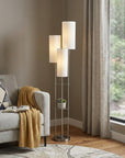 68" Silver Three Light Novelty Floor Lamp With White Linen Cylinder Shade