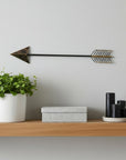 Burnished Dark Brown And Gold Tone Metal Arrow Wall Decor