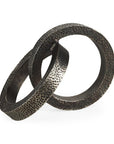 Two Ring Gray Hammered Metal Sculpture