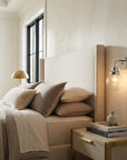 One Light Silver Wall Sconce with Round Glass Shade