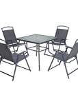 Five Piece Clear and Black Square Glass Dining Set with Four Chairs