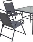 Five Piece Clear and Black Square Glass Dining Set with Four Chairs