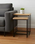 Set of Two 25" Black And Brown Solid Wood Nested Tables
