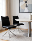 Set of Two Tufted Black And Silver Upholstered Faux Leather Dining Parsons Chairs