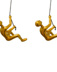 Set of Two Gold Resin Climbing Man Hanging Dimensional Sculpture