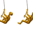 Set of Two Gold Resin Climbing Man Hanging Dimensional Sculpture