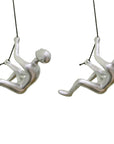 Set of Two Silver Resin Climbing Man Hanging Dimensional Sculpture