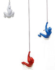 Set of Three Blue Red And White Resin Climbing Man Hanging Dimensional Sculpture
