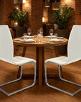 Set of Two White And Silver Faux Leather And Metal Dining Side Chairs
