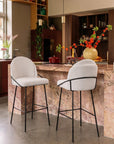 Set of Two 30" Ivory And Black Shearling And Fabric And Steel Bar Height Bar Chairs