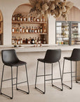 Set of Two 29" Black Faux Leather And Steel Counter Height Bar Chairs