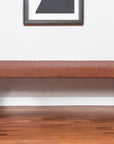 54" Brown and Black Faux Leather Upholstered Dining Bench