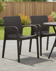 Set of Two Black Faux Rattan Heavy Duty Plastic Outdoor Stacking Arm Chairs