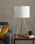 Gold Metal Adjustable Height Tripod Table Lamp With White Drum Shade