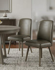 Set of Two Gray Faux Leather And Solid Wood Dining Side Chairs