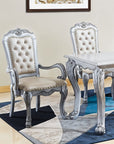 Set of Two Tufted White Upholstered Faux Leather And Wood Dining Arm Chairs