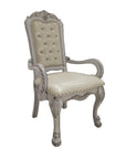 Set of Two Tufted White Upholstered Faux Leather And Wood Dining Arm Chairs