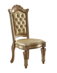Set of Two Tufted Bone and Brass Upholstered Faux Leather And Wood Dining Side Chairs