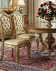 Set of Two Tufted Bone and Brass Upholstered Faux Leather And Wood Dining Side Chairs