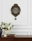 16" Brown And Silver Resin Silent Pendulum Ornate Oval Wall Clock
