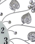 27" Silver White And Black Metal and Glass Silent Analog Floral Round Wall Clock