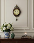 15" Brown And Gold Resin Silent Pendulum Ornate Oval Wall Clock