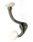 Set of Six Bronze And White Cast Iron And Ceramic Double Wall Hooks