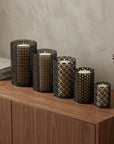 Set of Five Dark Brown Pierced Geometric Metal Tabletop Hurricane Candle Holders
