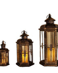 Set of Three Black And Gold Distressed Filigree Metal Tabletop Lantern Candle Holders