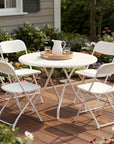 Set of Four White Metal Outdoor Folding Stacking Dining Chairs