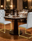Set of Two Gray And Gold Tufted Faux Leather And Metal Dining Side Chairs