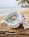 6" Light Blue Sea Salt And Orchid Scented Soy Wax Candle In White Resin Novelty Holder