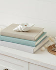 6" Light Blue Sea Salt And Orchid Scented Soy Wax Candle In White Resin Novelty Holder