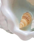 6" Light Blue Sea Salt And Orchid Scented Candle In White Resin Novelty Holder With Shells
