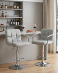 Set of Two Black And Silver Faux Leather And Aluminum Adjustable Height Swivel Bar Chairs