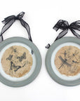 Set of Two Green And Ivory Butterfly Glass Circle