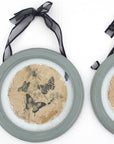 Set of Two Green And Ivory Butterfly Glass Circle
