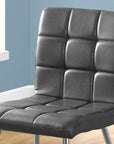 Set of Two Tufted Gray And Silver Upholstered Faux Leather Dining Side Chairs