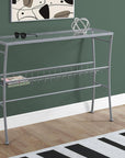 42" Clear and Silver Glass and Metal Console Table With Shelf