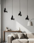 Set of Four Black Resin Climbing Man Hanging Dimensional Sculpture