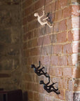 Set of Two Black Resin Climbing Man Hanging Dimensional Sculpture