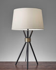 Black Metal Tripod Leg With Antique Brass Accent Table Lamp