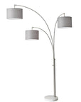 74" Brass Three Light Arc Floor Lamp With Off White Fabric Drum Shade