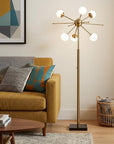 64" Brass Six Light LED Novelty Floor Lamp With White Glass Globe Shades